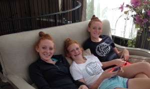 giggling girls on a couch